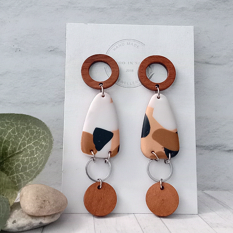 Add a touch of sophistication to your outfit with our unique Polymer Clay Earrings