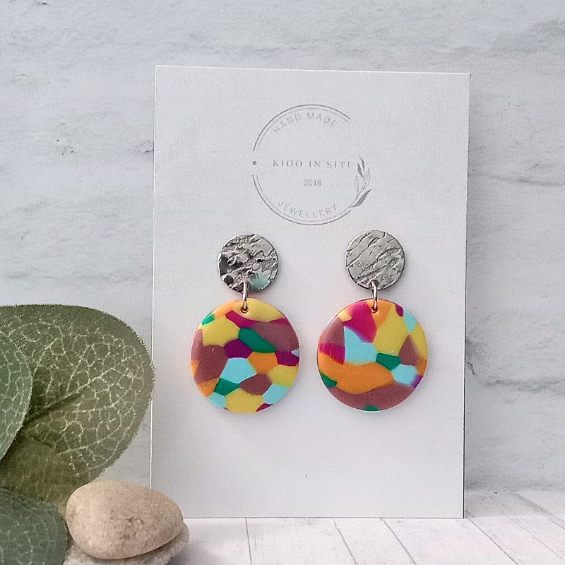 Put a spark of flair and funk into your everyday look with these Polymer Cly Earrings. Crafted with an array of colors, these earrings are both daring and stylish.